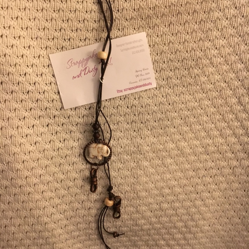 Eloquent elephant boho style necklace leather cord